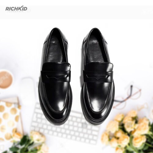 Black penny loafer